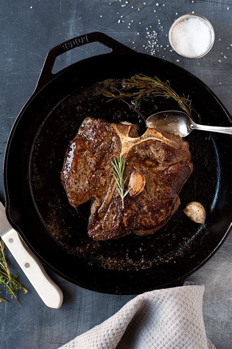 t-bone-steak-with-garlic-and-rosemary image