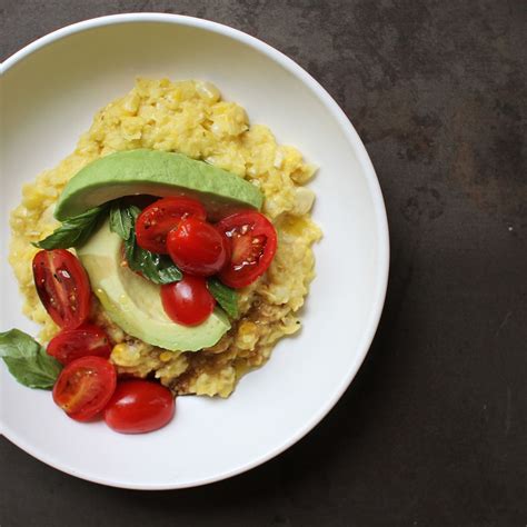 fresh-corn-polenta-with-avocado-and-tomato-salad image