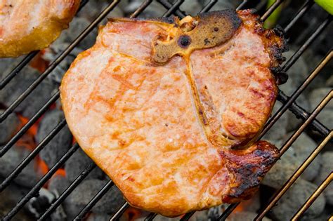 grilled-bourbon-brined-pork-chops-recipe-the-meatwave image
