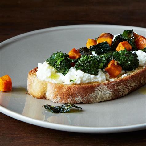 roasted-broccoli-rabe-sweet-potato-ricotta-crostini image