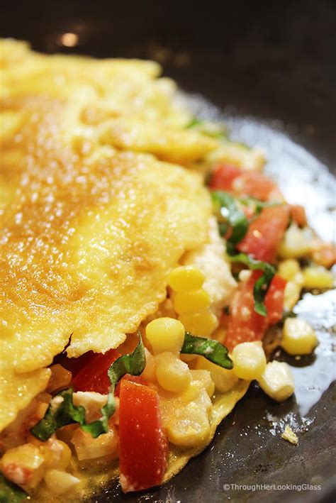 summer-corn-basil-tomato-feta-easy-omelette image