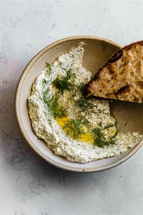 garlicky-herbed-goat-cheese-spread-a-beautiful-plate image