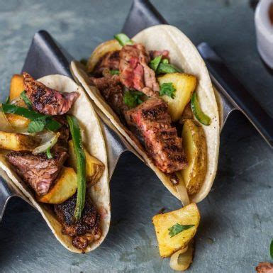 steak-and-potato-tacos-with-poblano-chilies-potatoes image