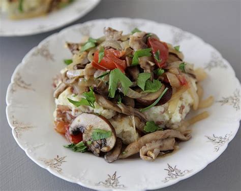 fricassee-of-mushrooms-over-rosemary-potatoes image