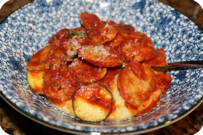 sausage-and-zucchini-over-parmesan-polenta-tasty image