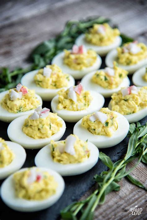 crab-stuffed-deviled-eggs-with-tarragon image