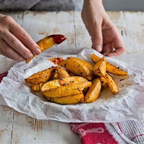 best-crispy-baked-potato-wedges-recipe-sunday image