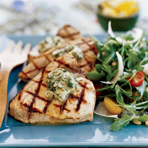 grilled-swordfish-steaks-with-basil-caper-butter image