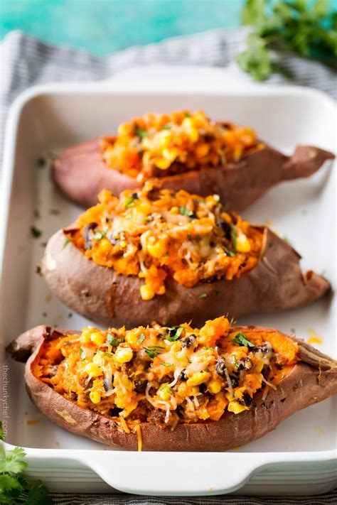 chorizo-enchilada-stuffed-sweet-potatoes-the-chunky image