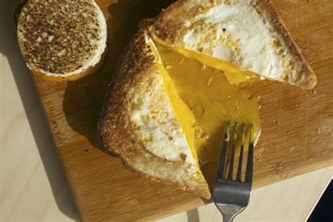how-to-make-an-egg-in-a-hole-grilled-cheese-sandwich image