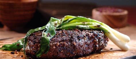 sichuan-peppercorn-steak-with-grilled-green-onions image