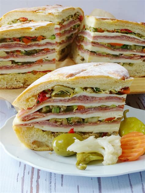 how-to-make-a-muffuletta-sandwich-proud-italian image