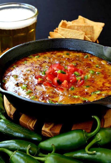 skillet-sausage-and-beer-queso-an-addicting-dip image