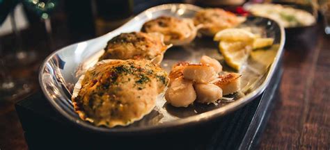 feast-of-the-seven-fishes-parmesan-baked-scallops image