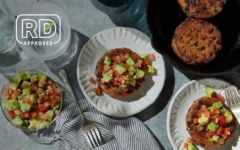 chipotle-black-bean-burgers-with-avocado-salsa image