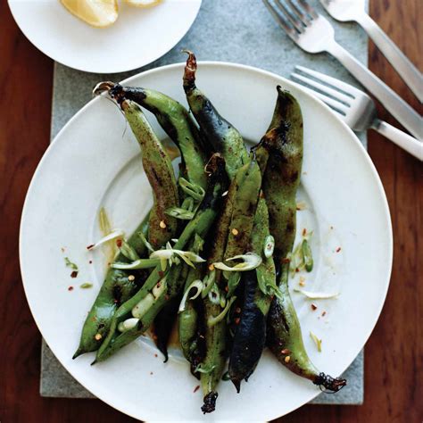 grilled-fava-bean-pods-with-chile-and-lemon image