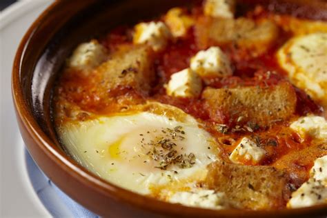 baked-eggs-with-tomato-and-feta-recipe-food image
