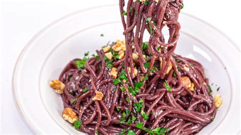 red-wine-spaghetti-with-walnuts-pecorino-and-parsley-rachael image