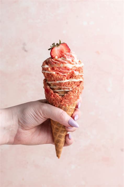 no-bake-strawberry-crunch-cheesecake-waffle-cones image