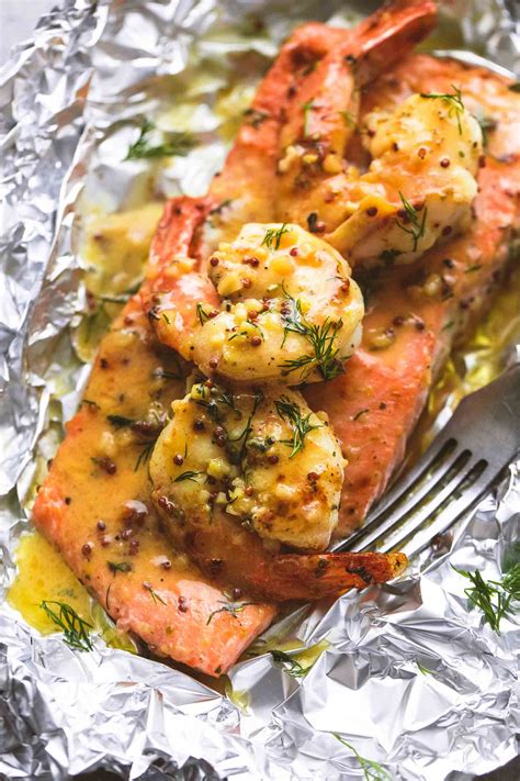 garlic-dijon-shrimp-and-salmon-foil-packs image