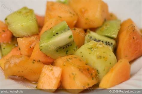 mixed-fruit-salad-with-citrus-mint-dressing image