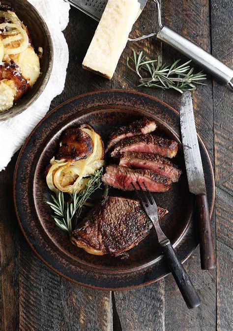 new-york-strip-steak-recipe-with-lyonnaise-potatoes image