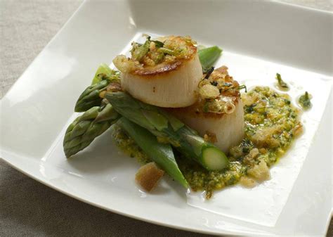 seared-scallops-with-asparagus-and-meyer-lemon-pesto image