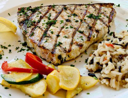 broiled-swordfish-steaks-recipe-the-spruce-eats image