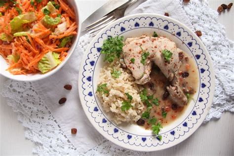poached-chicken-thighs-and-rice-with-white-sauce image