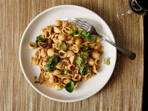 pasta-with-mushrooms-brussels-sprouts-and-parmesan image