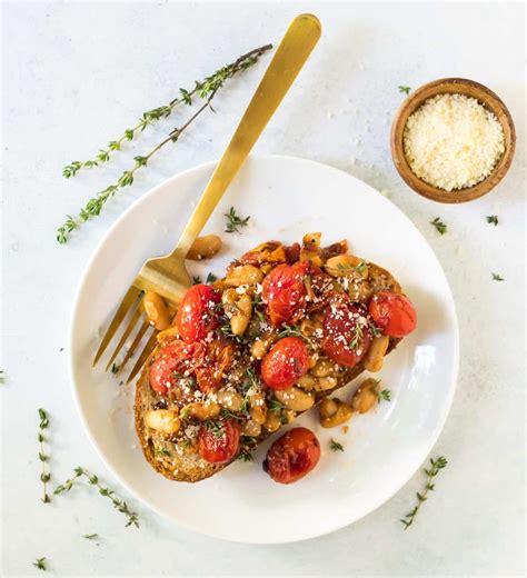 tuscan-white-bean-toasts-with-garlic-and-tomatoes image