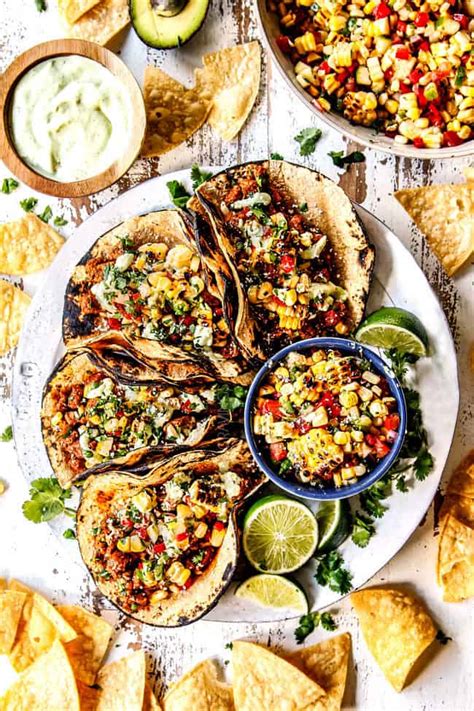 quick-and-easy-pork-tacos-with-corn-salsa-avocado-crema image