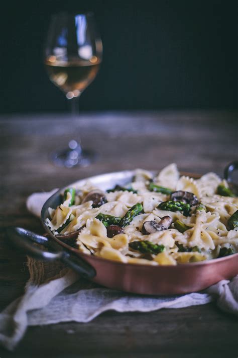 creamy-bow-tie-pasta-with-mushrooms-and-asparagus image