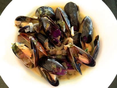 steamed-mussels-in-white-wine-garlic-butter-and-herbs image