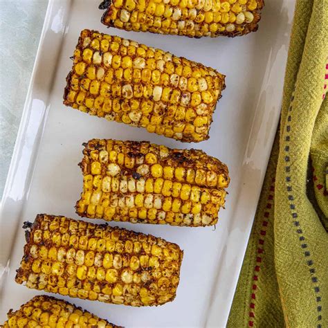 jerk-rubbed-grilled-corn-on-the-cob-chili-pepper image