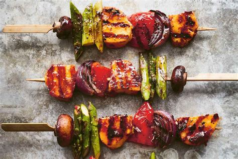 grilled-vegetable-skewers-with-harissa-marinated-halloumi image
