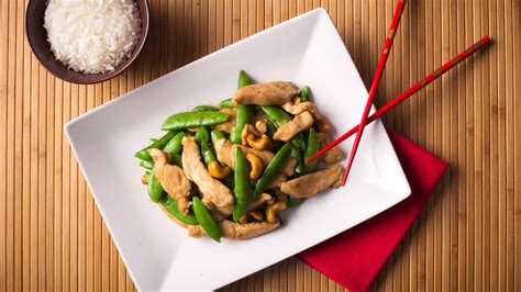 healthy-chinese-cashew-chicken-with-peas-cooking image