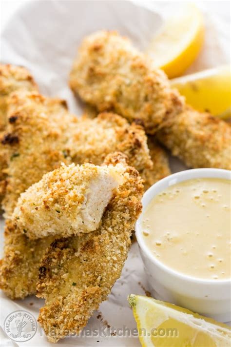 baked-breaded-chicken-strips-recipe-with-honey image