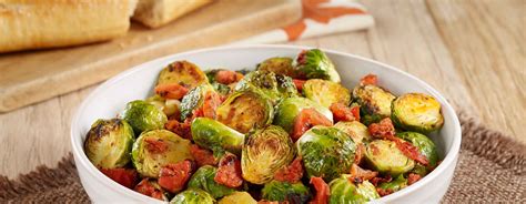 oven-roasted-brussels-sprouts-with-tomatoes-ready image