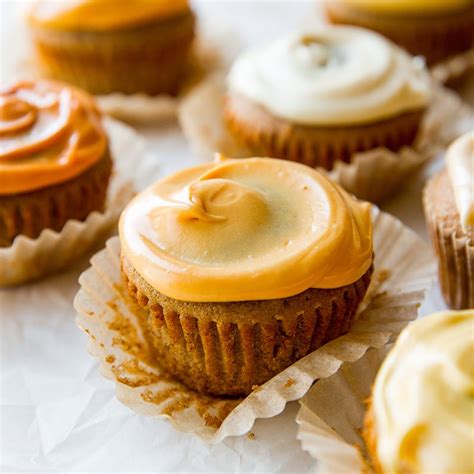 spice-cupcakes-with-autumn-colored-cream-cheese image
