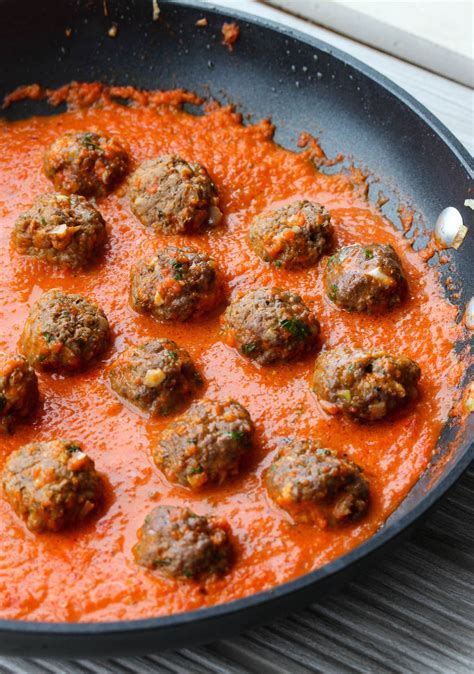 moroccan-lentil-meatballs-with-roasted-red-pepper-sauce image