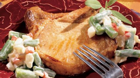 pork-chops-with-creamy-gravy-and-vegetables-pillsburycom image
