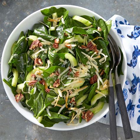 spinach-salad-with-warm-maple-dressing-eatingwell image