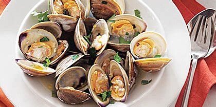 grilled-clams-with-garlic-recipe-myrecipes image