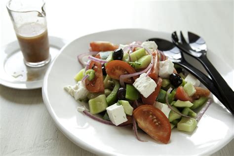 greek-tomato-salad-with-feta-cheese-and-olives image