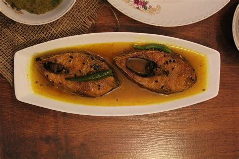 ilish-er-tel-jhol-recipe-bengali-hilsa-fish-curry image