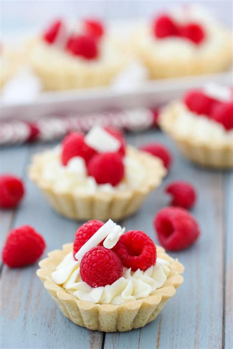 white-chocolate-raspberry-mini-tarts-momsdish image