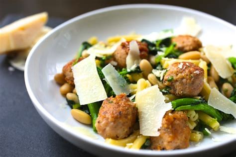 pasta-with-sausage-broccoli-rabe-and-white-beans image