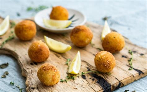 arancini-golden-rice-balls-of-sicily-glutto-digest image