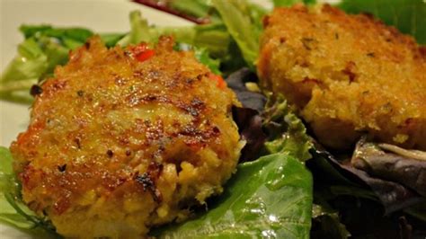 spicy-lemon-crab-cakes-on-mixed-greens image